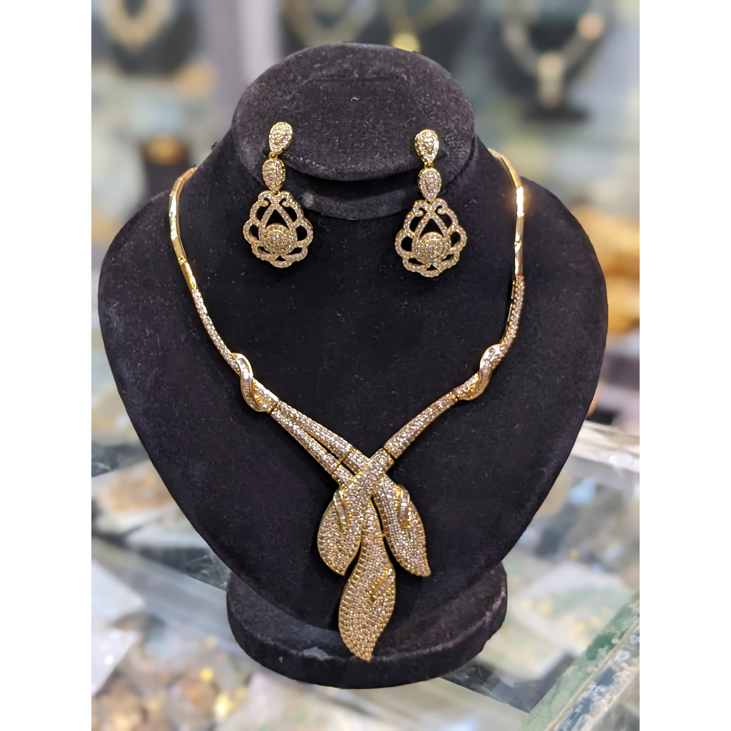 Elegant Gold Plated Necklace Set with Studded Leaf Design